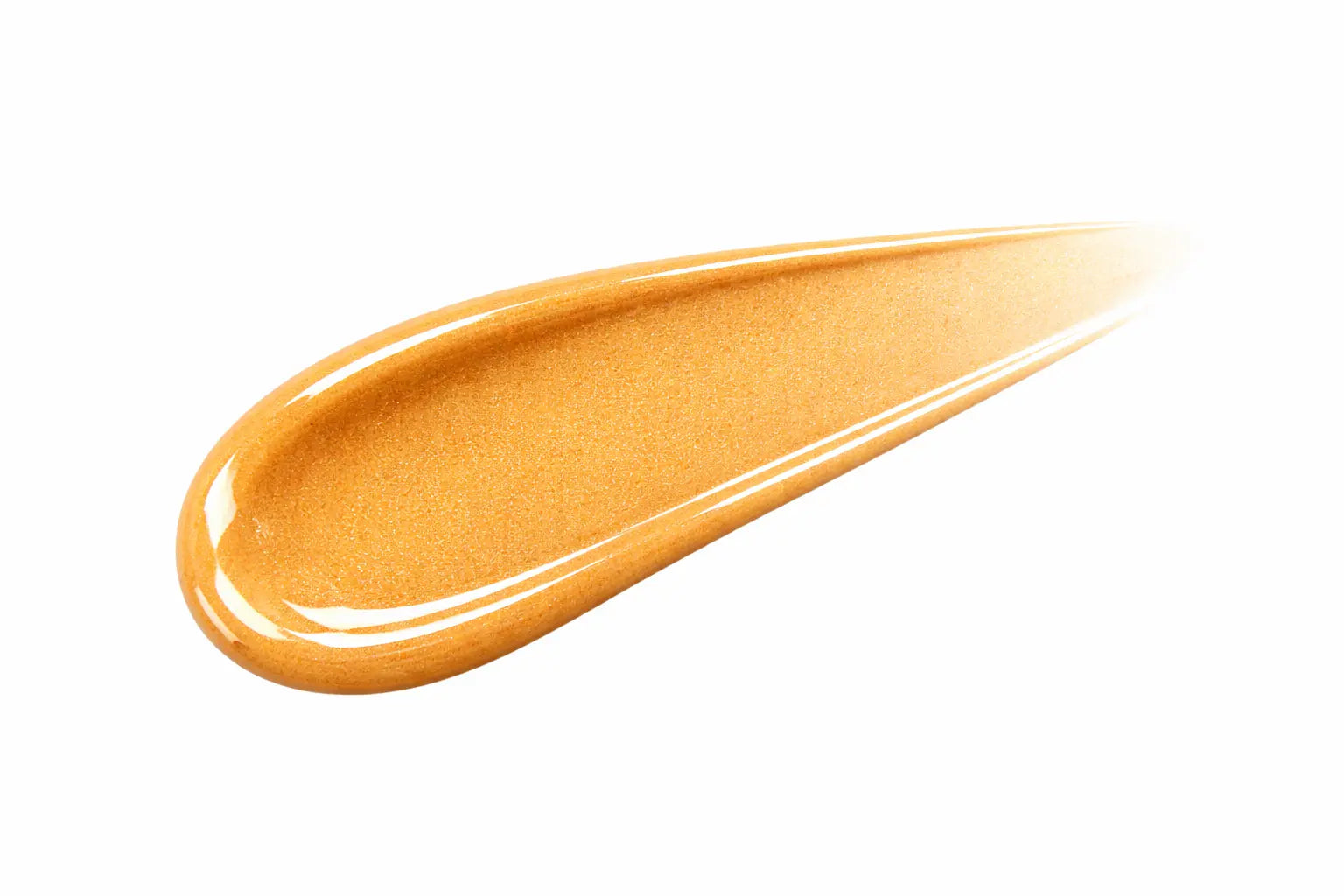 Close-up of a gold lip gloss swatch on a white background