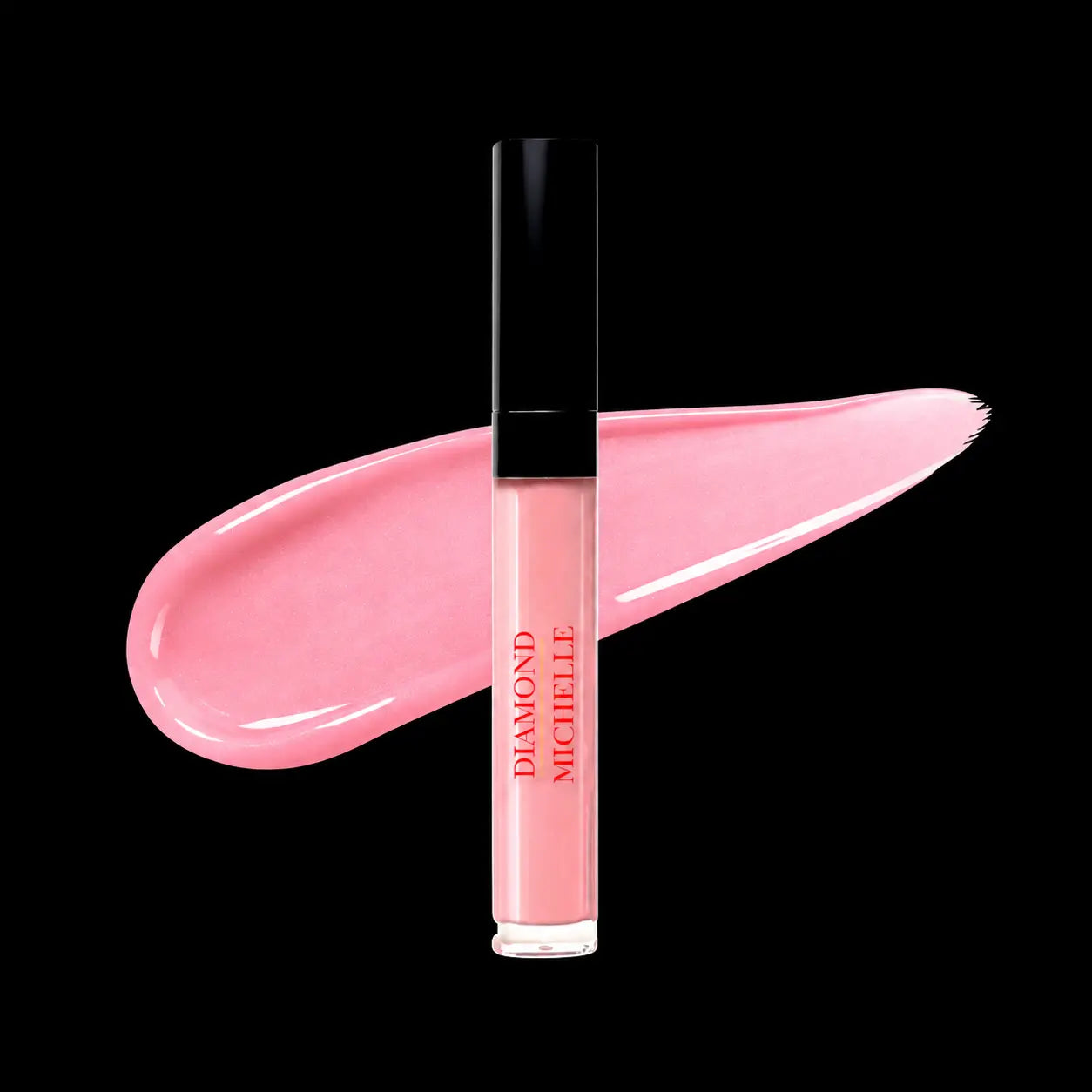 Light pink lip oil with black cap on a black background