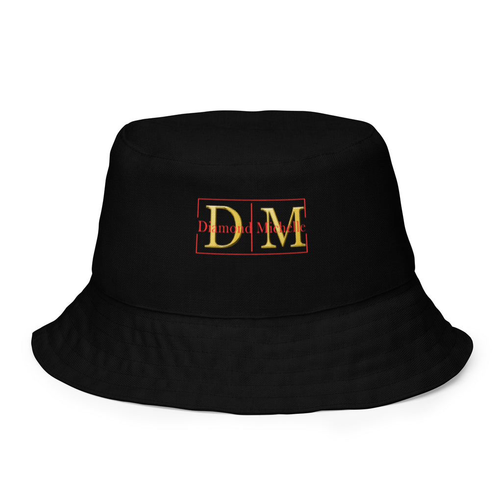 Black bucket hat with 'DM' logo on a white background