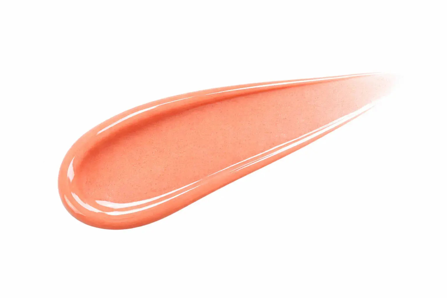Peach colored lip gloss swatch on a white background