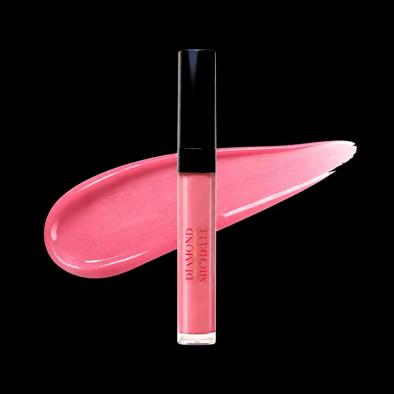 Pink lip oil with black cap on a black background