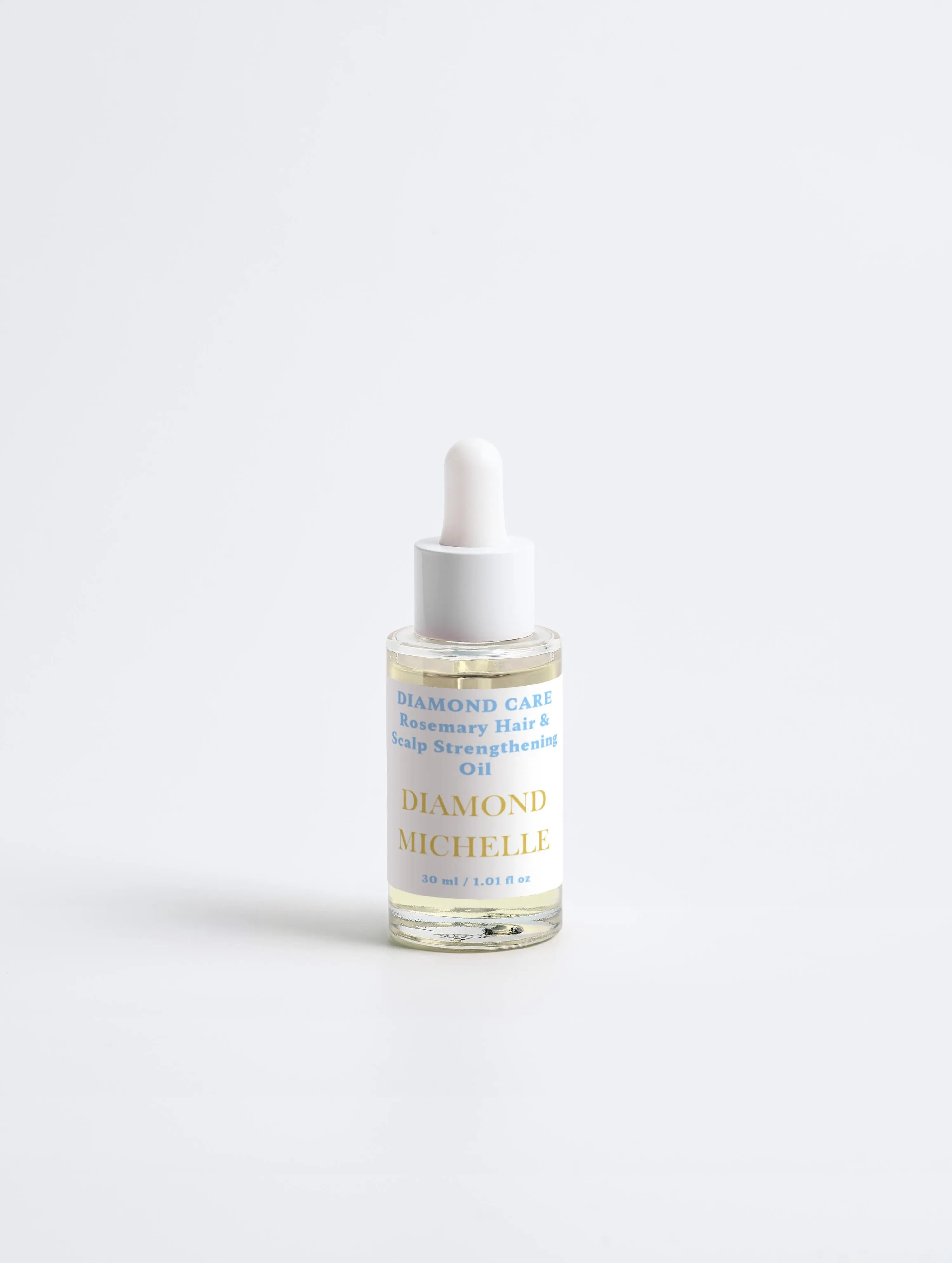 Diamond Care Rosemary Hair & Scalp Strengthening Oil by Diamond Michelle (front view)