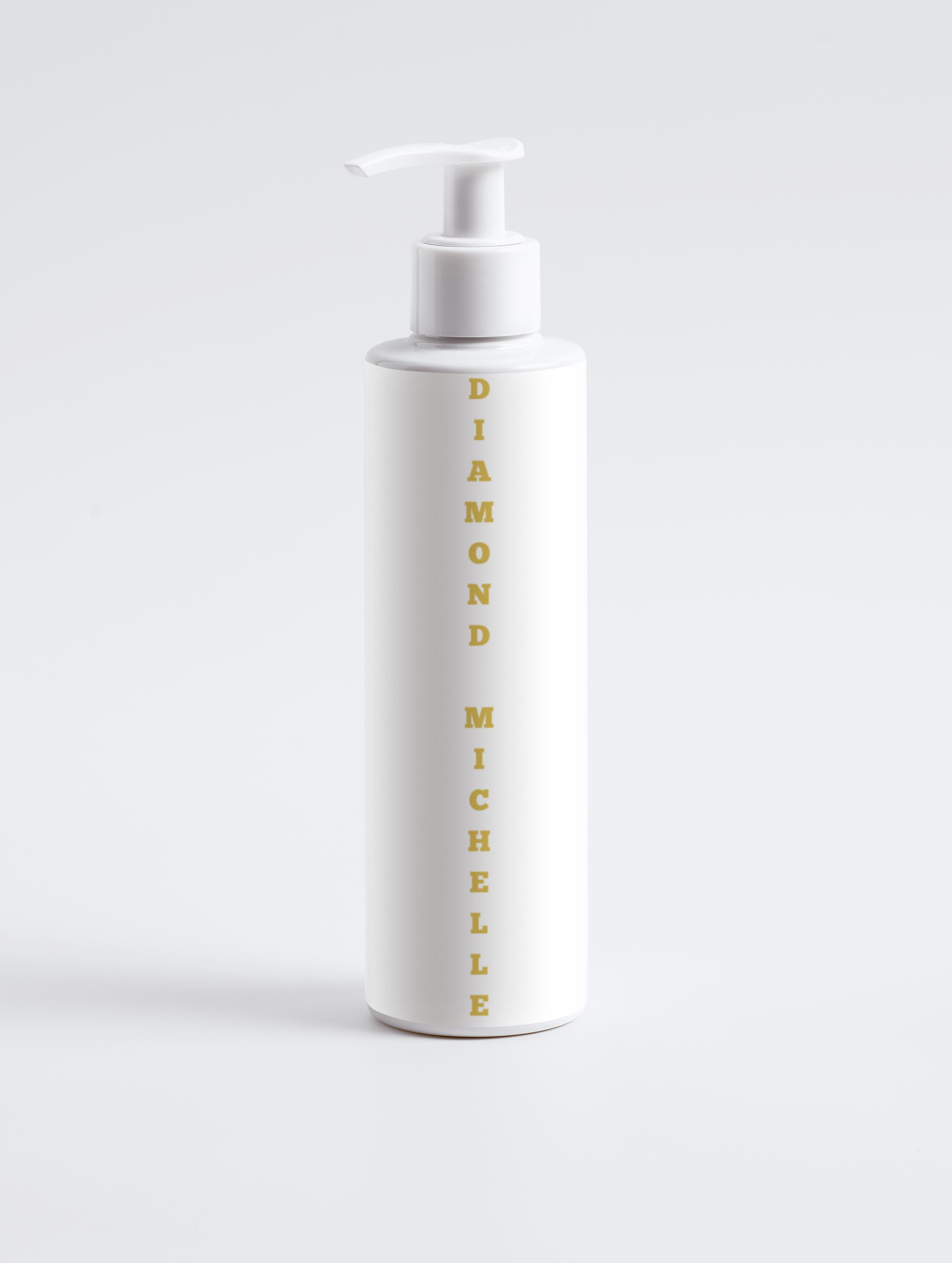 White bottle with 'Diamond Michelle' text on a light gray background