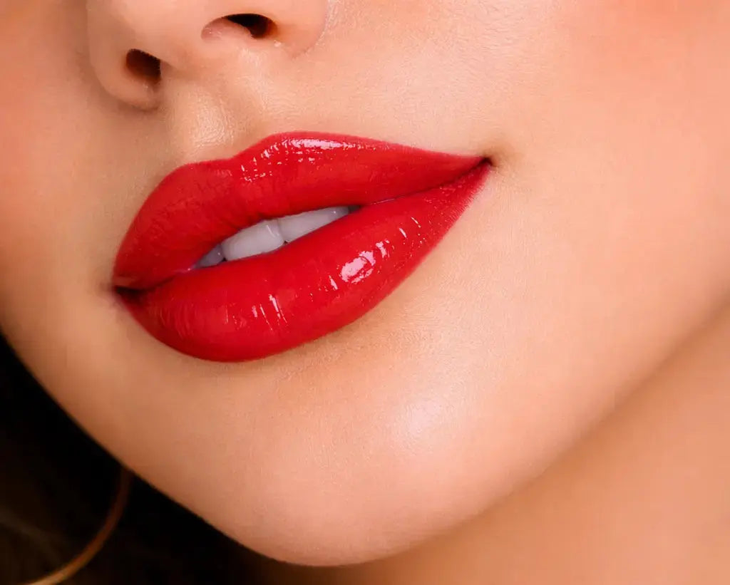 Close-up of a woman's face with Diamond Michelle lady scarlet red automatic lip liner.