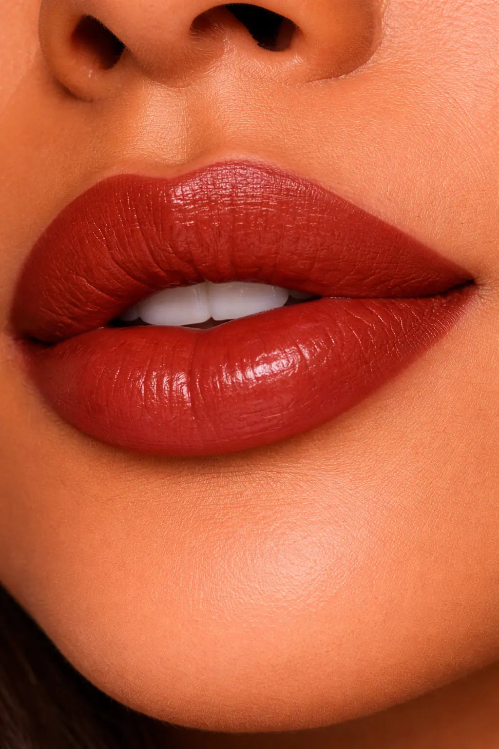 dm luxury matte lipstick showgirl shade on lips
